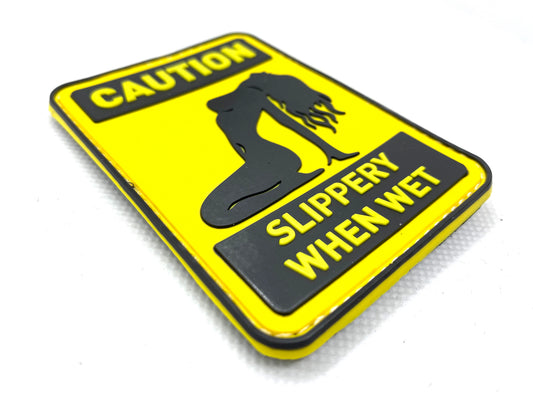 CAUTION - SLIPPERY WHEN WET